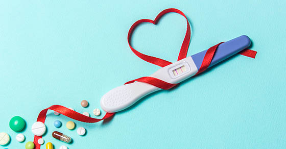 Treatment of infertility with pills, help in conceiving a child. Tablets from pregnancy do not work, contraception. Positive pregnancy test with two strips and a red ribbon in the form of a heart