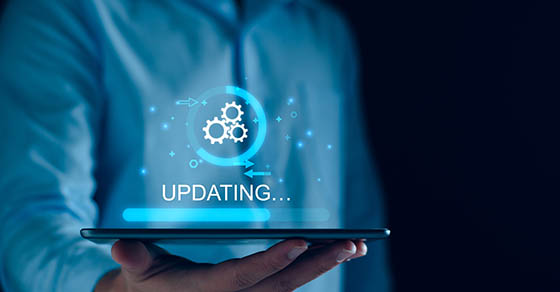 Operating system upgrade concept, installation app and software update process, modernize user equipment, update modern functions, developer released new version Improved security. User is downloading