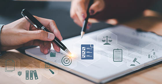 Businessman validates and manages business documents and agreements ,legal contract ,signing business contract approval ,joint venture agreement ,contract documents confirmation ,guarantee correctness
